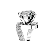 Solitaire Engagement Ring Setting for Heart-Shaped Center with Pave Bypass Swirl Band and Prong Head in Platinum