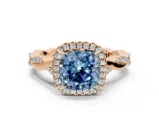 Halo Engagement Ring Setting for Fancy Blue Cushion Cut Center with Twist Band and Prong Head in Rose Gold