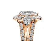 Halo Engagement Ring Setting for Pear-Shaped Center with Two-Strand Split Shank and Prong Head in Rose Gold