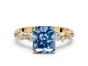 Cluster Engagement Ring Setting for Fancy Blue Radiant Cut Center with Round Cut Accent Band and Prong Head in Yellow Gold