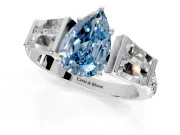 Channel-Set Engagement Ring Setting for Fancy Blue Pear-Shaped Center with Baguette Band and Prong Head in Sterling Silver