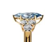 Cluster Engagement Ring Setting for Fancy Blue Marquise Center with Round Cut Accent Frame and Prong Head in Yellow Gold