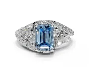 Halo Engagement Ring Setting for Fancy Blue Emerald Cut Center with Marquise and Pave Bypass Band and Prong Head in White Gold
