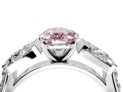 Channel-Set Engagement Ring Setting for Fancy Pink Pear-Shaped Center with Baguette Band and Prong Head in Platinum