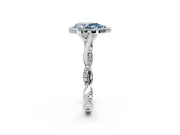 Halo Engagement Ring Setting for Fancy Blue Pear-Shaped Center with Twist Band and Prong Head in Sterling Silver