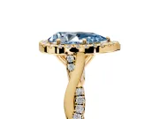 Halo Engagement Ring Setting for Fancy Blue Pear-Shaped Center with Twist Band and Prong Head in Yellow Gold