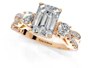 3 Stone Engagement Ring Setting for Emerald Cut Center with Pave Split Shank and Prong Head in Rose Gold