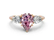 3 Stone Engagement Ring Setting for Fancy Pink Pear-Shaped Center with Large Pear-Shaped Accents and Prong Head in Rose Gold