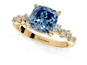 Solitaire Engagement Ring Setting for Fancy Blue Cushion Cut Center with Trailing Leaf Accent Band and Prong Head in Yellow Gold