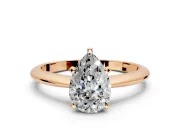 Solitaire Engagement Ring Setting for Pear-Shaped Center with Knife Ridge Band and Claw Prong Head in Rose Gold