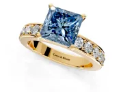 Solitaire Engagement Ring Setting for Fancy Blue Princess Cut Center with Channel-Set Accents and Prong Head in Yellow Gold