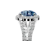 Halo Engagement Ring Setting for Fancy Blue Round Cut Center with Pave Split Shank and Prong Head in White Gold
