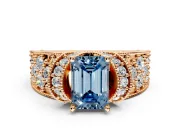 Pave Engagement Ring Setting for Fancy Blue Emerald Cut Center with Curved Accent Rows, Openwork and Prong Head in Rose Gold