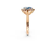 Starburst Halo Engagement Ring Setting for Fancy Blue Pear-Shaped Center with Thin Round-Wire Band and Prong Head in Rose Gold
