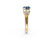 Cluster Engagement Ring Setting for Fancy Blue Round Cut Center with Round Cut Accent Frame and Prong Head in Yellow Gold