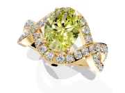 Halo Engagement Ring Setting for Fancy Yellow Oval Center with Pave Infinity Twist Band and Prong Head in Yellow Gold