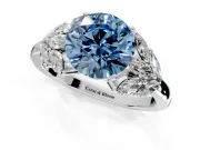 Leaf Cluster Engagement Ring Setting for Fancy Blue Round Cut Center with Marquise Accents and Prong Head in Platinum