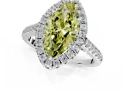 Halo Engagement Ring Setting for Fancy Yellow Marquise Center with Narrowing Pave Band and Prong Head in Platinum
