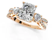 3 Stone Engagement Ring Setting for Radiant Cut Center with Pave Split Shank and Prong Head in Rose Gold