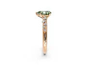 Cluster Engagement Ring Setting for Fancy Green Pear-Shaped Center with Round Cut Accent Band and Prong Head in Rose Gold