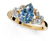 Solitaire Engagement Ring Setting for Fancy Blue Pear-Shaped Center with Marquise Flower Shoulders and Prong Head in Yellow Gold