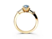 3 Stone Engagement Ring Setting for Fancy Blue Pear-Shaped Center with Channel Baguette Accents and Prong Head in Yellow Gold