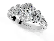Cluster Engagement Ring Setting for Oval Center with Bezel Accent Clusters and Prong Head in Platinum