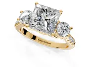 3 Stone Engagement Ring Setting for Princess Cut Center with Crossover Basket, Pave Band and Prong Head in Yellow Gold