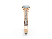 Solitaire Engagement Ring Setting for Fancy Blue Emerald Cut Center with Channel Band and Double Claw Prong Head in Rose Gold