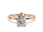 Hidden Halo Engagement Ring Setting for Pear-Shaped Center with Thin Rounded Band and Prong Head in Rose Gold