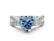 3 Stone Engagement Ring Setting for Fancy Blue Heart-Shaped Center with Pave Twist Band and Prong Head in Platinum