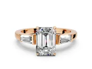 3 Stone Engagement Ring Setting for Emerald Cut Center with Baguette Accents and Prong Head in Rose Gold