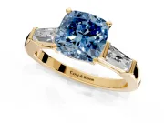 3 Stone Engagement Ring Setting for Fancy Blue Cushion Cut Center with Tapered Baguettes, Plain Band and Prong Head in Yellow Gold