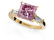 3 Stone Engagement Ring Setting for Fancy Pink Princess Cut Center with Channel Baguette Accents and Prong Head in Yellow Gold