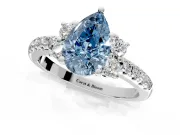 Paired Accent Engagement Ring Setting for Fancy Blue Pear-Shaped Center with Pave Band and Prong Head in White Gold