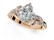 Solitaire Engagement Ring Setting for Pear-Shaped Center with Marquise Accent Twist Band and Prong Head in Rose Gold
