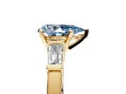 3 Stone Engagement Ring Setting for Fancy Blue Pear-Shaped Center with Channel Baguette Accents and Prong Head in Yellow Gold