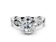 Solitaire Engagement Ring Setting for Round Cut Center with Accented Twist Band and Leaf Prong Head in Platinum