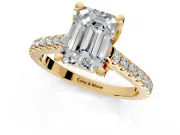 Solitaire Engagement Ring Setting for Emerald Cut Center with Widening Pave Band and Claw Prong Head in Yellow Gold