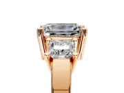 3 Stone Engagement Ring Setting for Emerald Cut Center with Matching Side Accents and Prong Head in Rose Gold