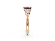 3 Stone Engagement Ring Setting for Fancy Pink Emerald Cut Center with Large Pear-Shaped Accents and Prong Head in Rose Gold