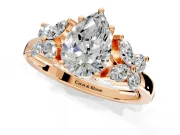 Floral Engagement Ring Setting for Pear-Shaped Center with Marquise Cluster Shoulders and Prong Head in Rose Gold