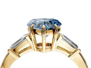3 Stone Engagement Ring Setting for Fancy Blue Heart-Shaped Center with Baguette Accents and Prong Head in Yellow Gold