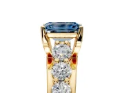 Solitaire Engagement Ring Setting for Fancy Blue Emerald Cut Center with Graduated Shared Prongs and Prong Head in Yellow Gold