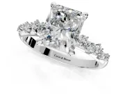 Solitaire Engagement Ring Setting for Radiant Cut Center with Trailing Leaf Accent Band and Prong Head in Platinum