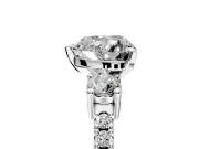 3 Stone Engagement Ring Setting for Heart-Shaped Center with Round Cut Side Accents and Prong Head in Platinum
