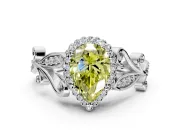 Halo Engagement Ring Setting for Fancy Yellow Pear-Shaped Center with Leaf Motif Split Shank and Prong Head in Platinum