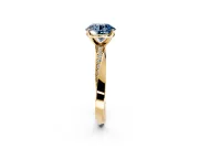 Side Accent Engagement Ring Setting for Fancy Blue Round Cut Center with Accent Shoulders and Prong Head in Yellow Gold