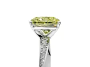 Side Accent Engagement Ring Setting for Fancy Yellow Radiant Cut Center with Accent Shoulders and Prong Head in Platinum