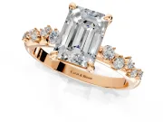 Solitaire Engagement Ring Setting for Emerald Cut Center with Trailing Leaf Accent Band and Prong Head in Rose Gold